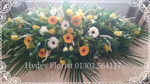 yellow-coffin-top-funeral-flowers-hydes-florist-doncaster  